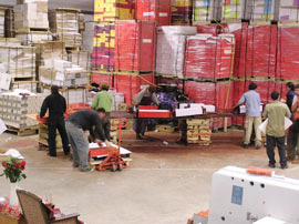Huge storage room for the dharma books at Dharma Press before they are distributed in Bodh Gaya.
	