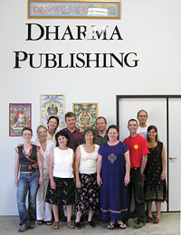 office of Dharma Publishing with a group of volunteers
		